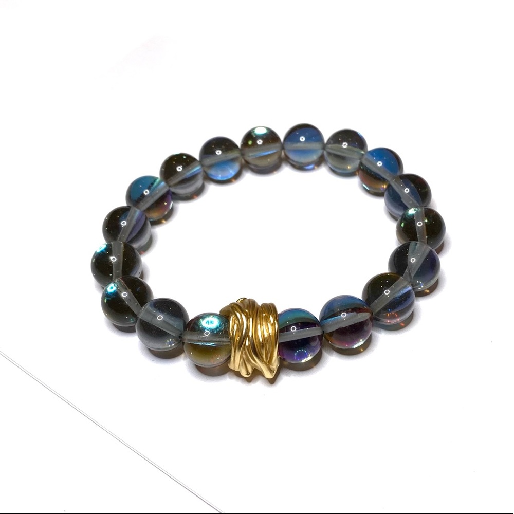 Iridescent Blue Beaded Bracelet With Gold Charm